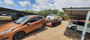 transporting a datsun and a ford focus 001