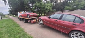 transporting a busted up mazda etude and bmw 3 series 002